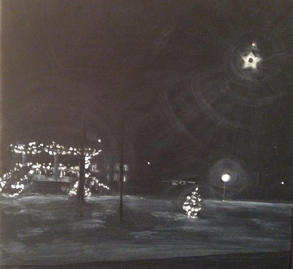 Fog is after the snow with holiday lights in the dark